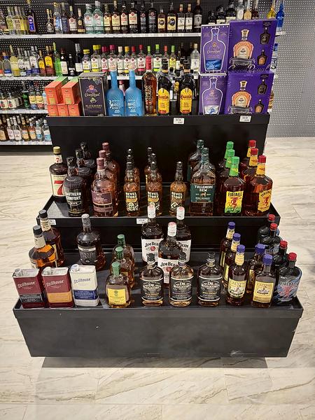 Tiered display of featured whiskeys and spirits