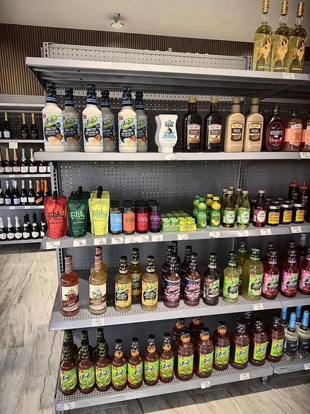 Shelves of cocktail mixes and ready-to-drink cocktails