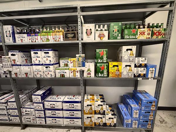 Shelves of domestic and imported beer cases
