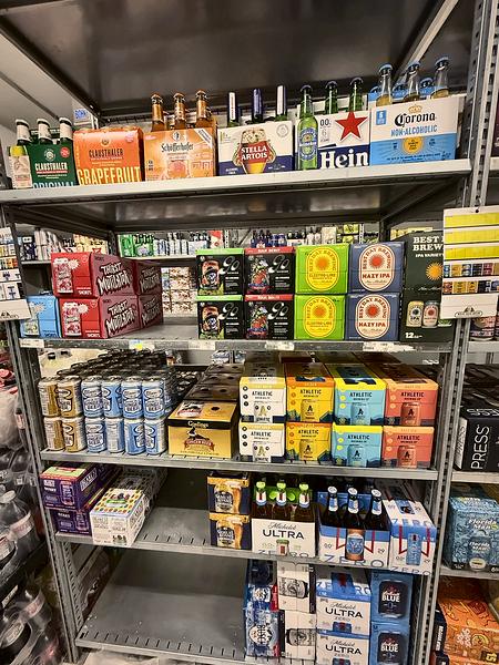 Import and craft beer packs on metal shelving